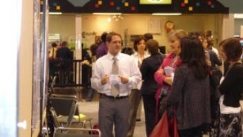 CNS researcher Eric Hazzard with his poster at Experimental Biology.